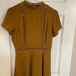 Mustard coloured high neck dress